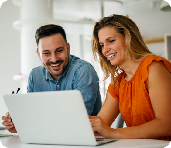 guy and girl at computer monitor