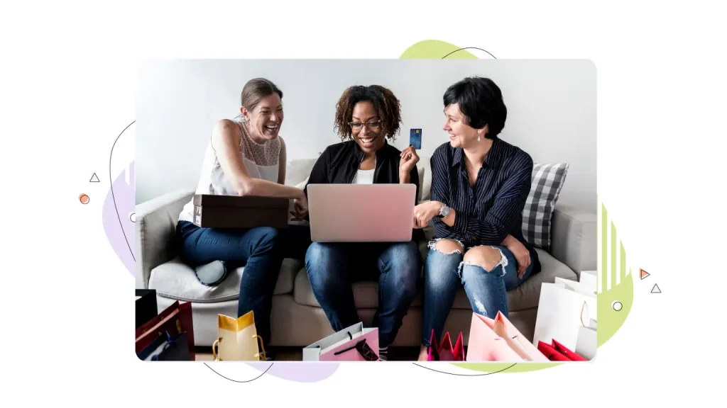 Three women sitting on a coach