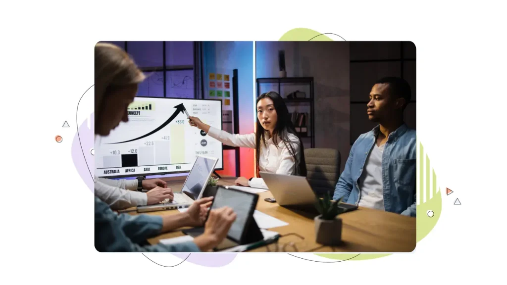 Coworkers looking at a conversion rate chart 