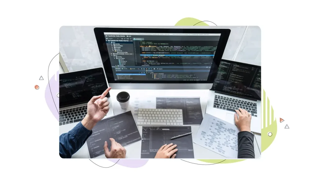 People testing code on a computer