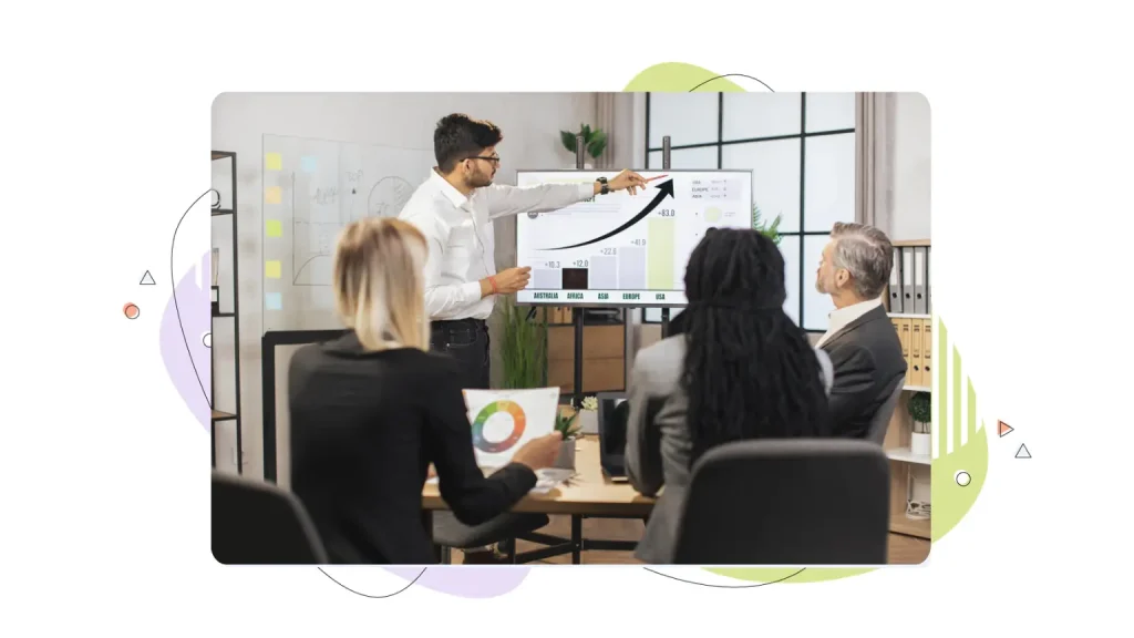 People looking at a conversion rate chart 