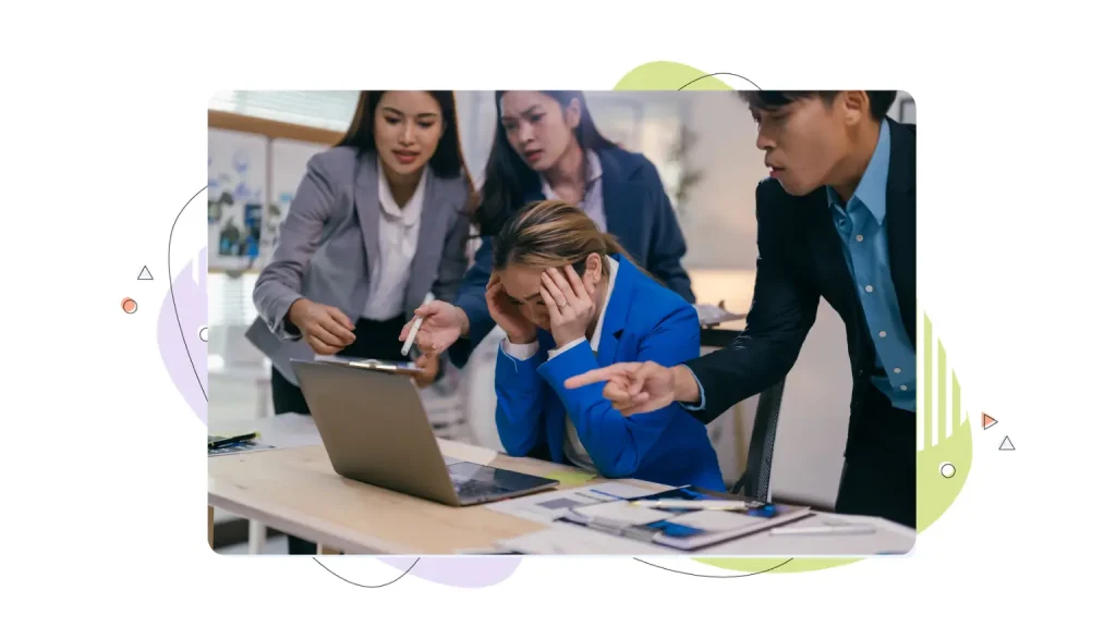 People looking upset in front of a computer