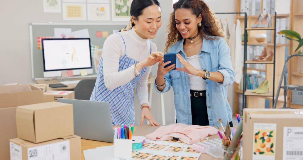 Photo, small business and people with phone for clothes advertising on social media. Entrepreneur w.