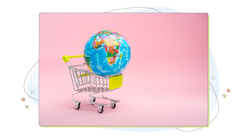 A shopping cart with a globe inside of it.