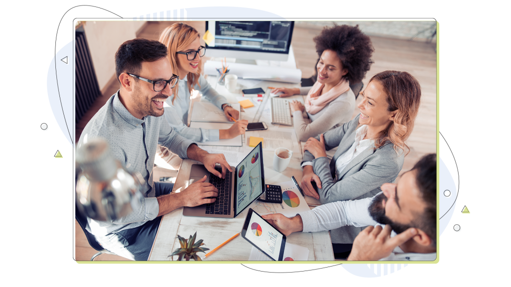 A team of affiliate marketers working on laptops