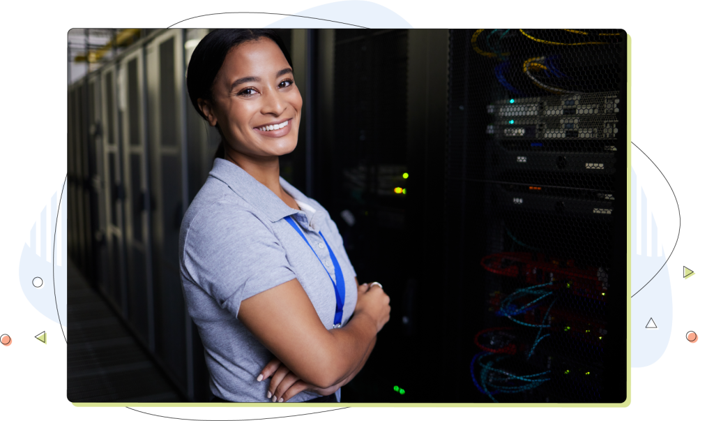 Technician and web administrator standing in front of server racks.