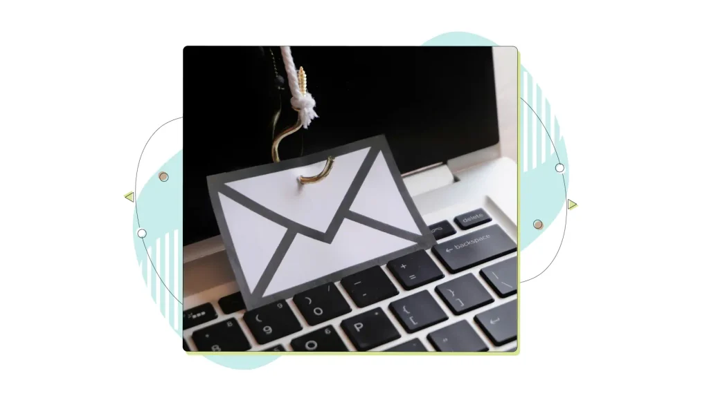 Closeup image of mail with hook on top of keyboard