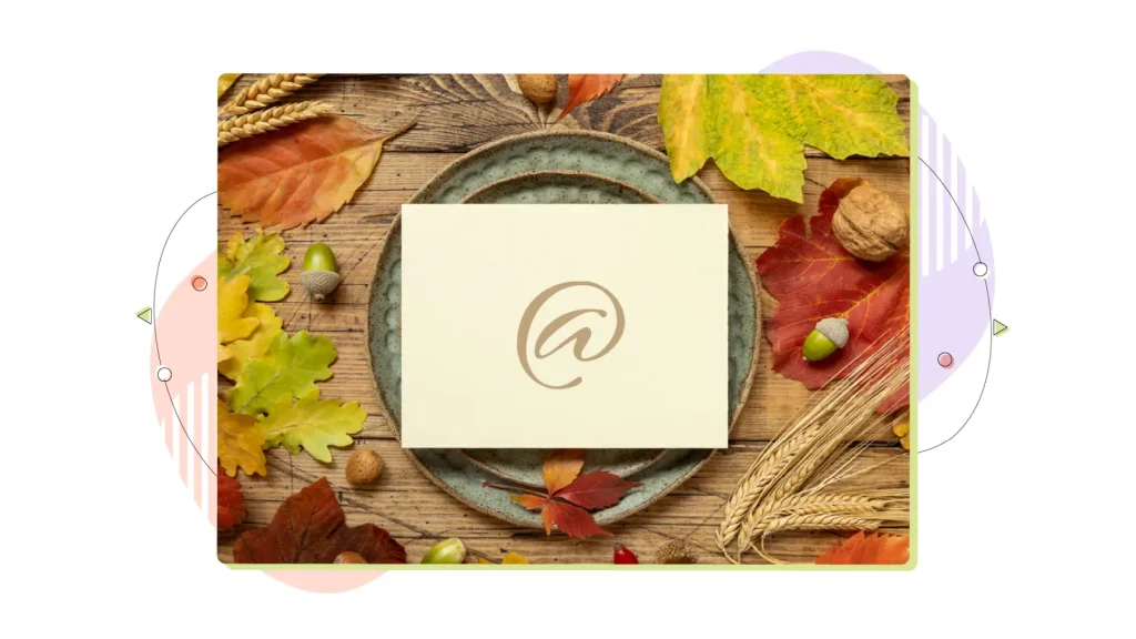 Autumn rustic table setting with blank card between leaves and berries top view.