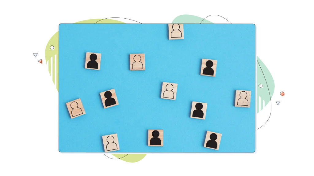 Wooden blocks with white and black mans on a blue background. Society problem concept.