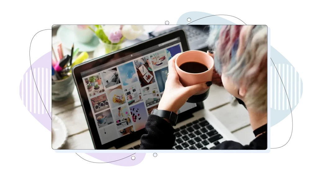 Woman Hands Holding Coffee Cup Working on Laptop.