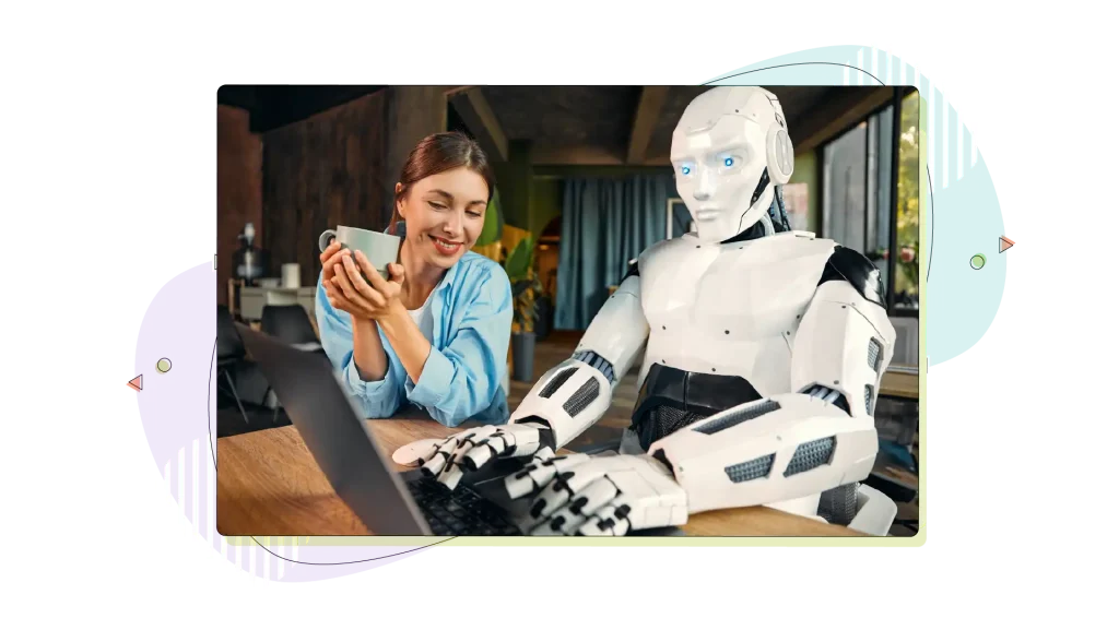 Robot and woman working on laptop in office.