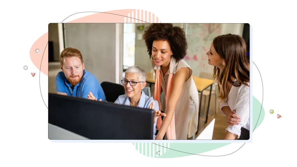 A group of software engineers working developing applications together in corporate office.