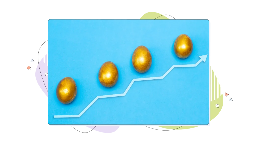 Easter eggs lined up on a blue surface and with an arrow that follows an upward path.