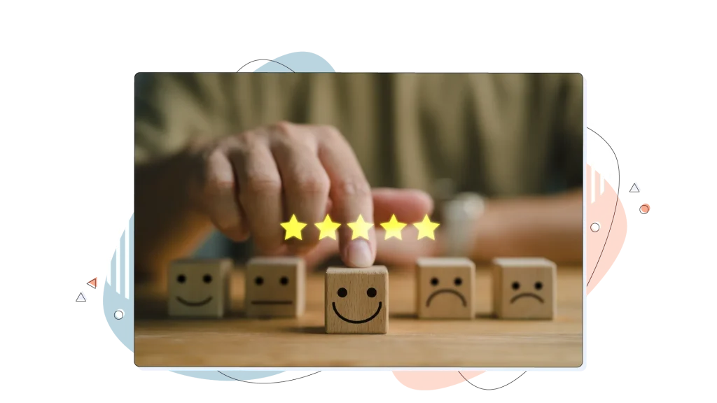 Wooden blocks with faces and five stars over them.