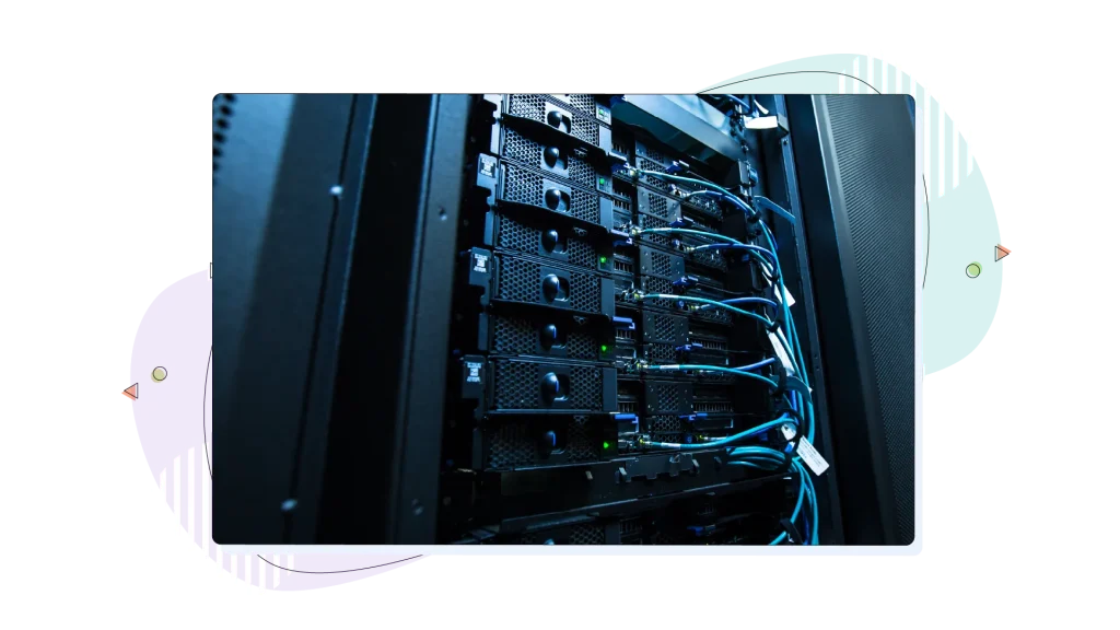 A data centre illuminated by ambient lighting and cables.