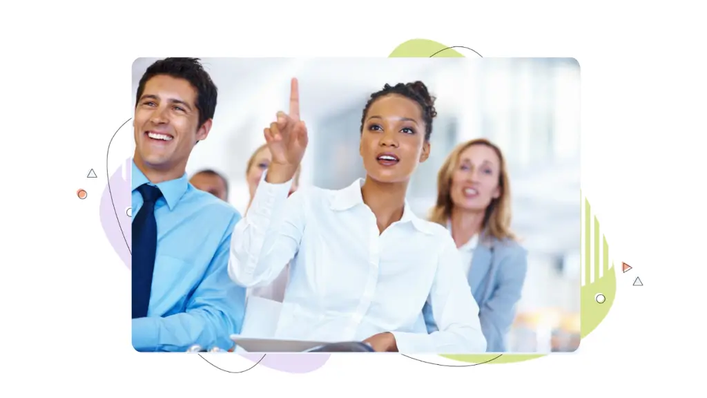In the middle of a meeting, a young businesswoman holds up her hand to try to ask a question about premium domains.