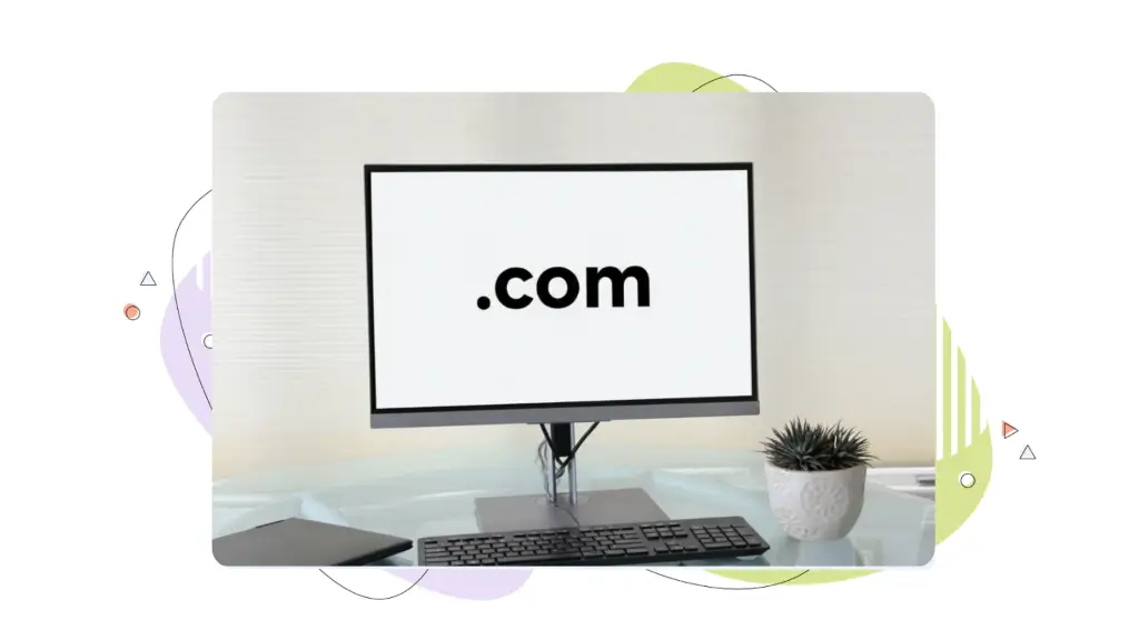 A desktop computer screen shows the letters .com while the user researches the premium domain's meaning.