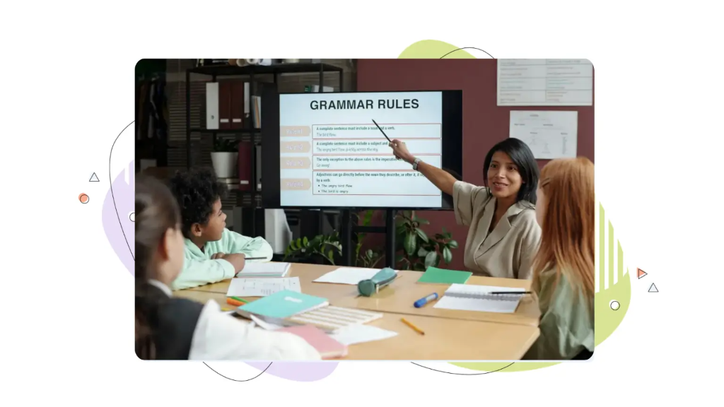 A teacher showing young students the rules of professional email format.